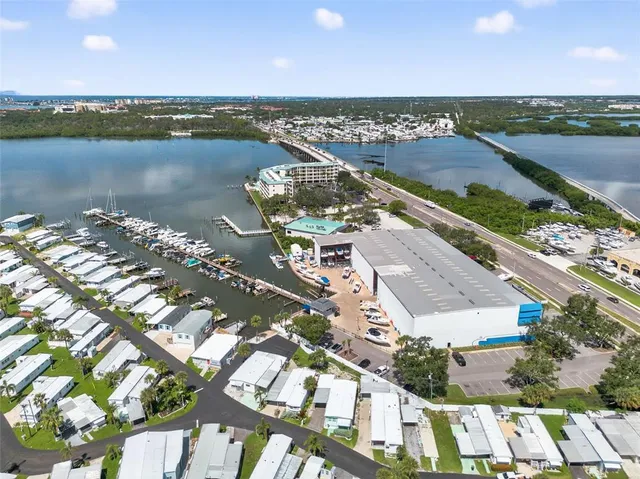 an aerial view of a house with a lake view