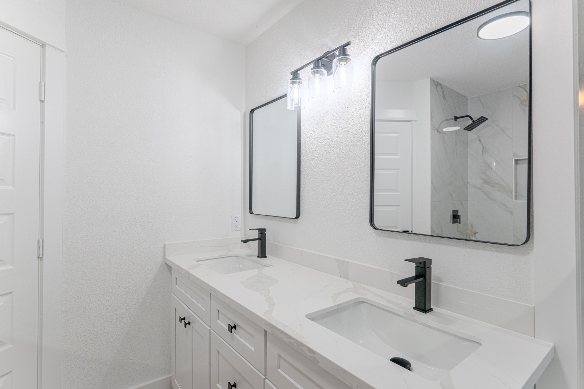 3702 Acorn Way Lane Spring, TX 77389 - Photo 25 of 38 a bathroom with double vanity sink and a mirror