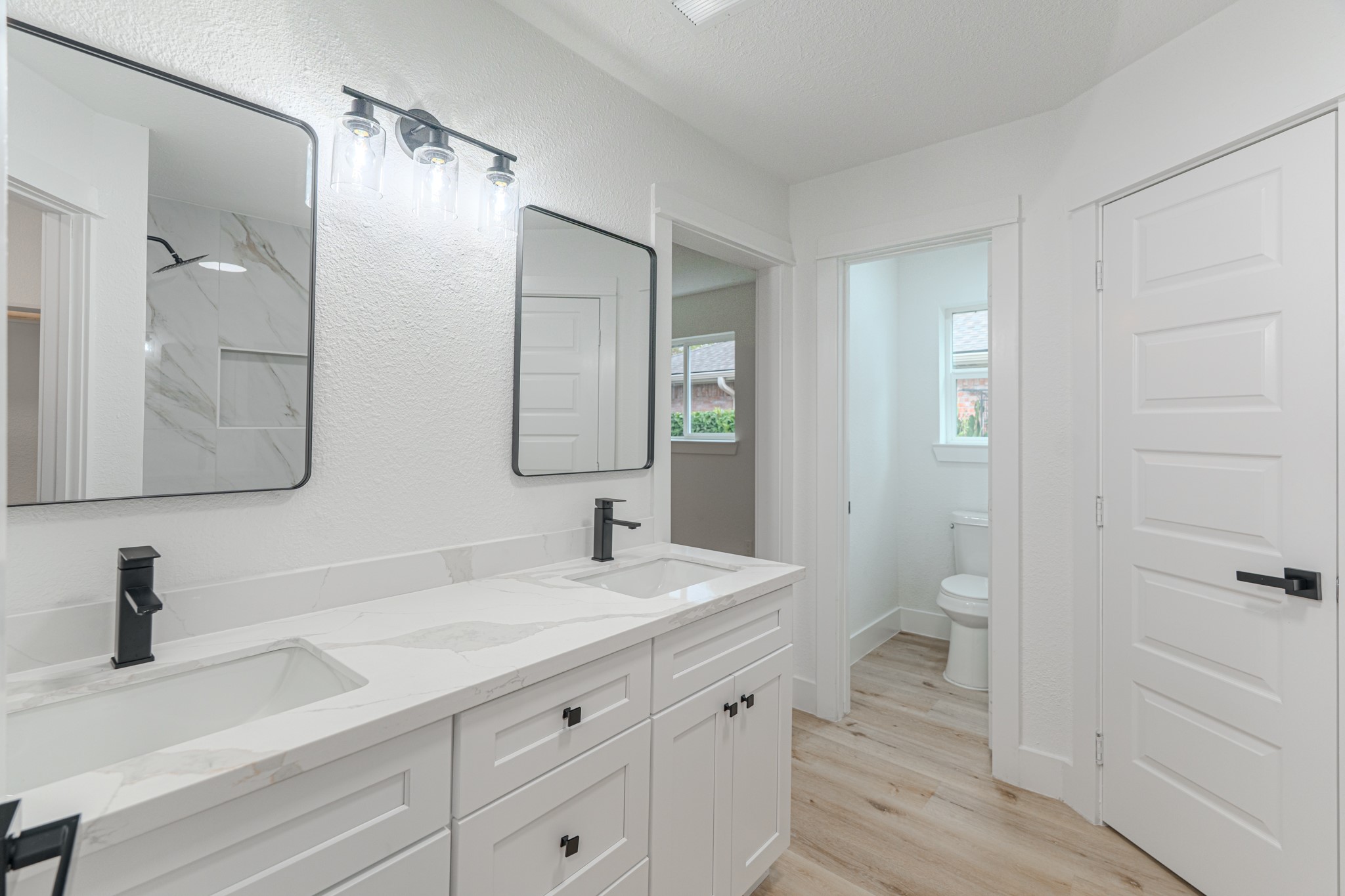 3702 Acorn Way Lane Spring, TX 77389 - Photo 26 of 38 a bathroom with a sink a toilet and a mirror