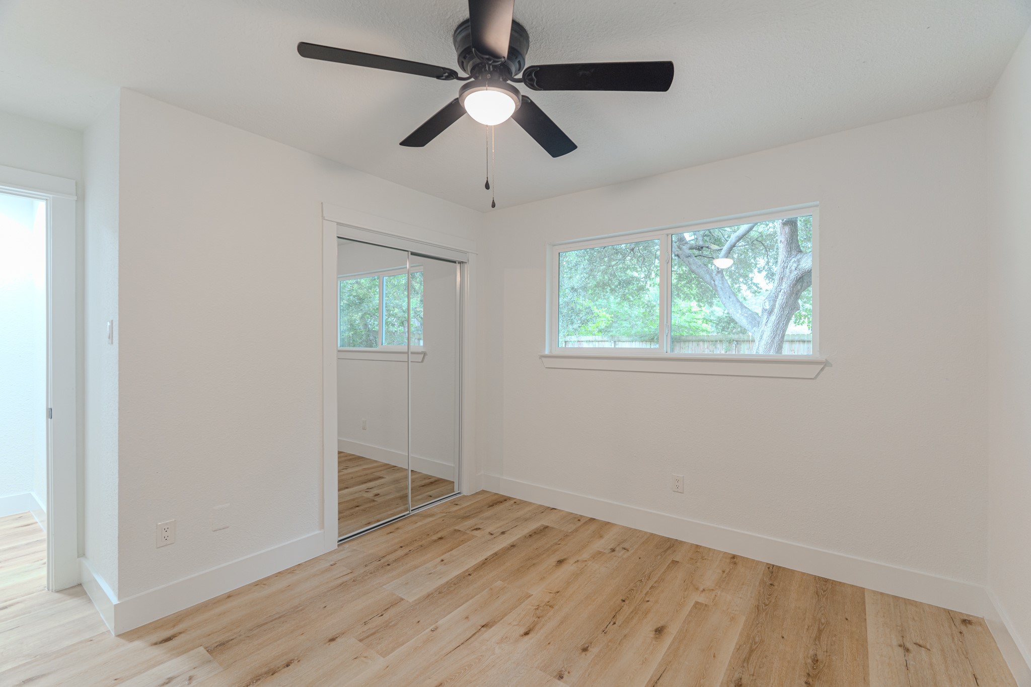 3702 Acorn Way Lane Spring, TX 77389 - Photo 30 of 38 a view of empty room with wooden floor and fan