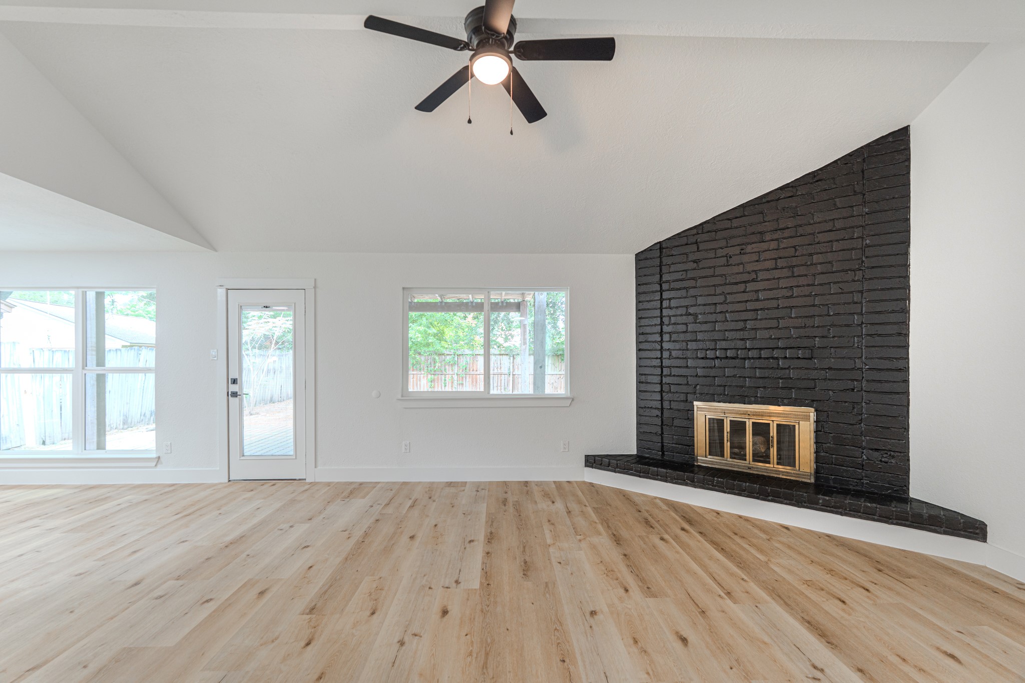 3702 Acorn Way Lane Spring, TX 77389 - Photo 5 of 38 a view of an empty room with wooden floor and a window