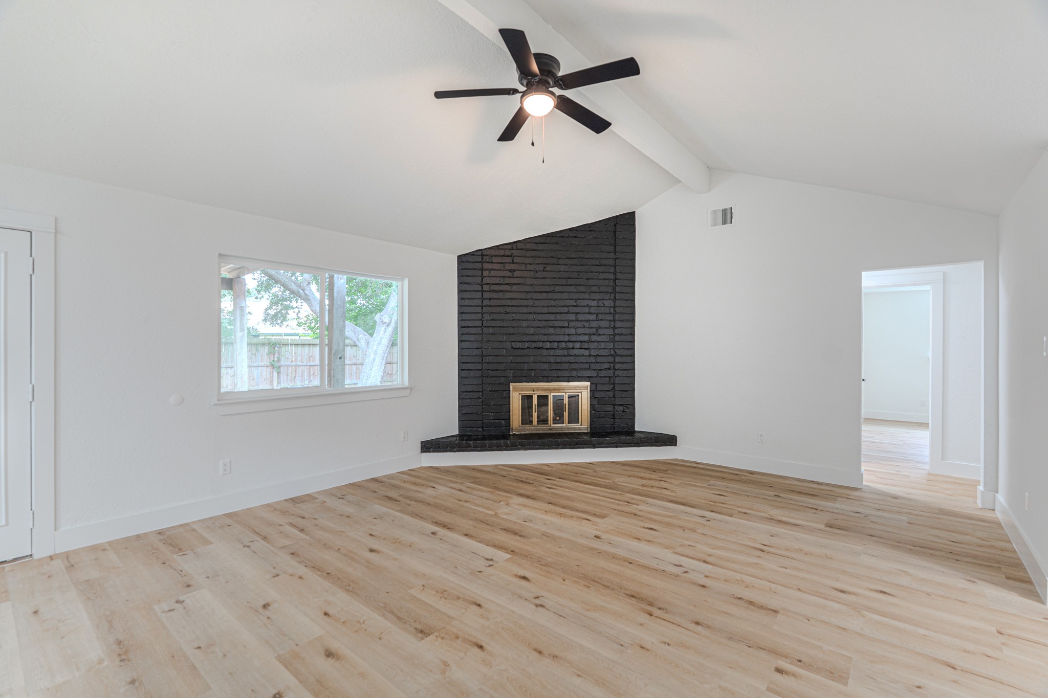 3702 Acorn Way Lane Spring, TX 77389 - Photo 6 of 38 an empty room with windows and a fireplace