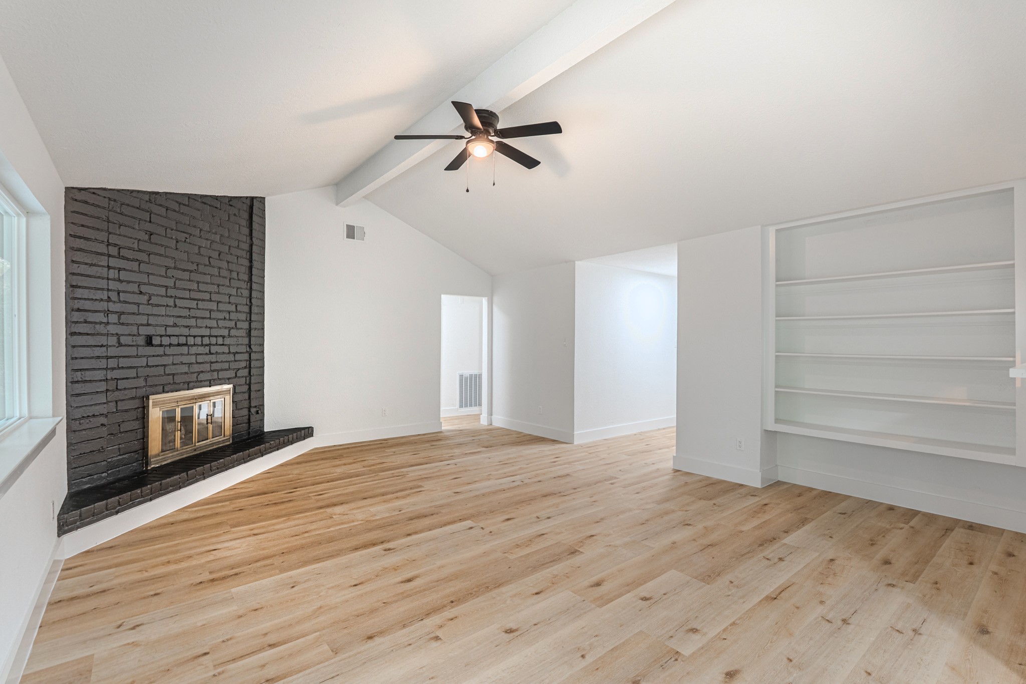 3702 Acorn Way Lane Spring, TX 77389 - Photo 8 of 38 a view of empty room with wooden floor and fan