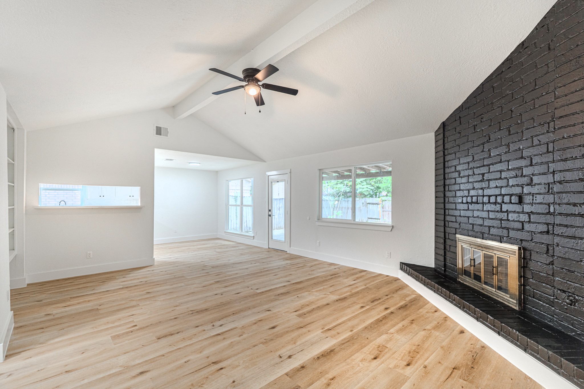 3702 Acorn Way Lane Spring, TX 77389 - Photo 10 of 38 a view of empty room with wooden floor and fireplace