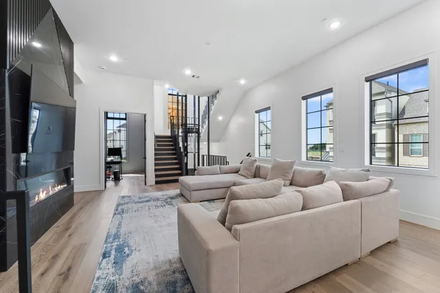a stove top oven sitting inside of a kitchen