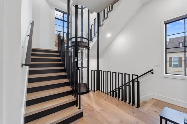 a front view of a building with a yard