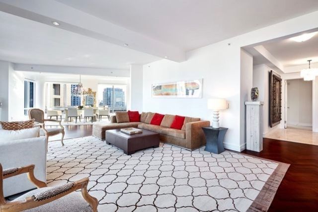 a living room with furniture and a couch