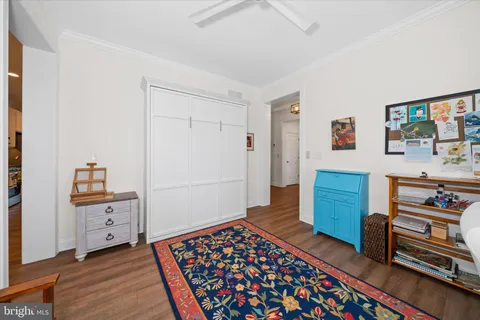 a bedroom with a bed and a cabinets