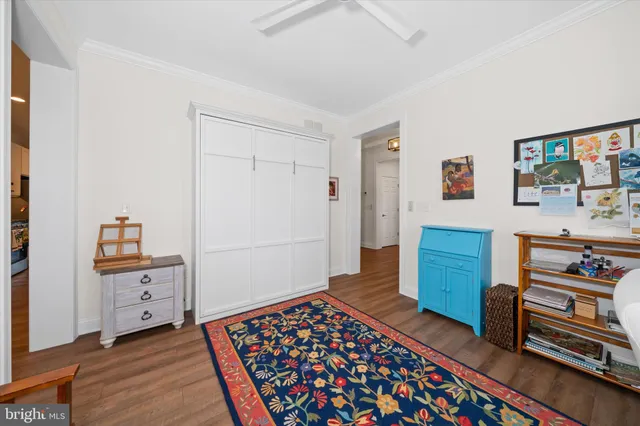 a bedroom with a bed and a cabinets