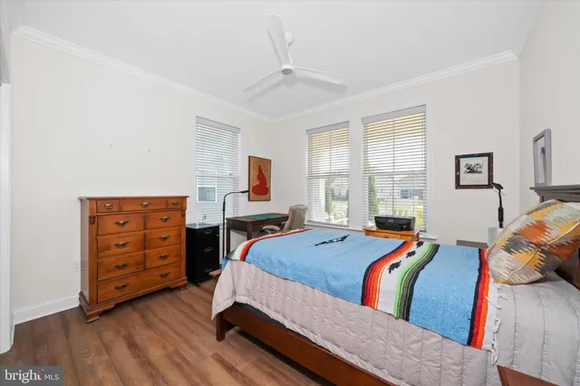 a bed room with a bed and a window