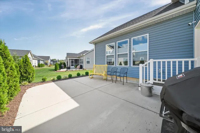 a view of porch with a bench