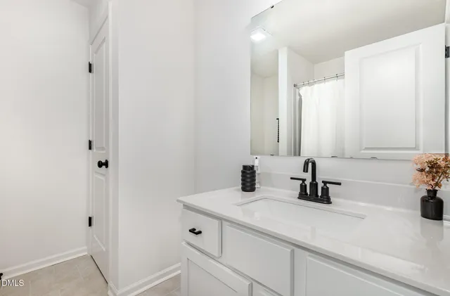 a view of a golf course with an ocean