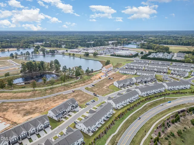an aerial view of a swimming pool and outdoor space