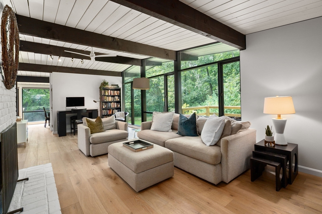 5 Apple Street Sherborn, MA 01770 - Photo 12 of 36 a living room with furniture and a large window
