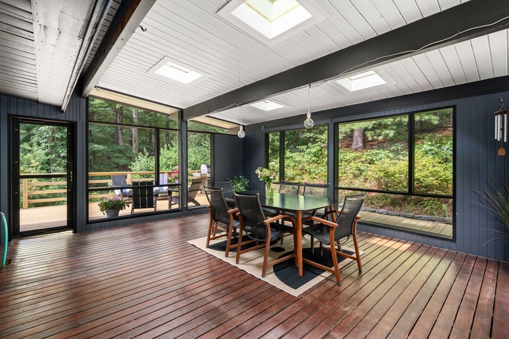 5 Apple Street Sherborn, MA 01770 - Photo 13 of 36 a living room with furniture floor to ceiling window and wooden floor