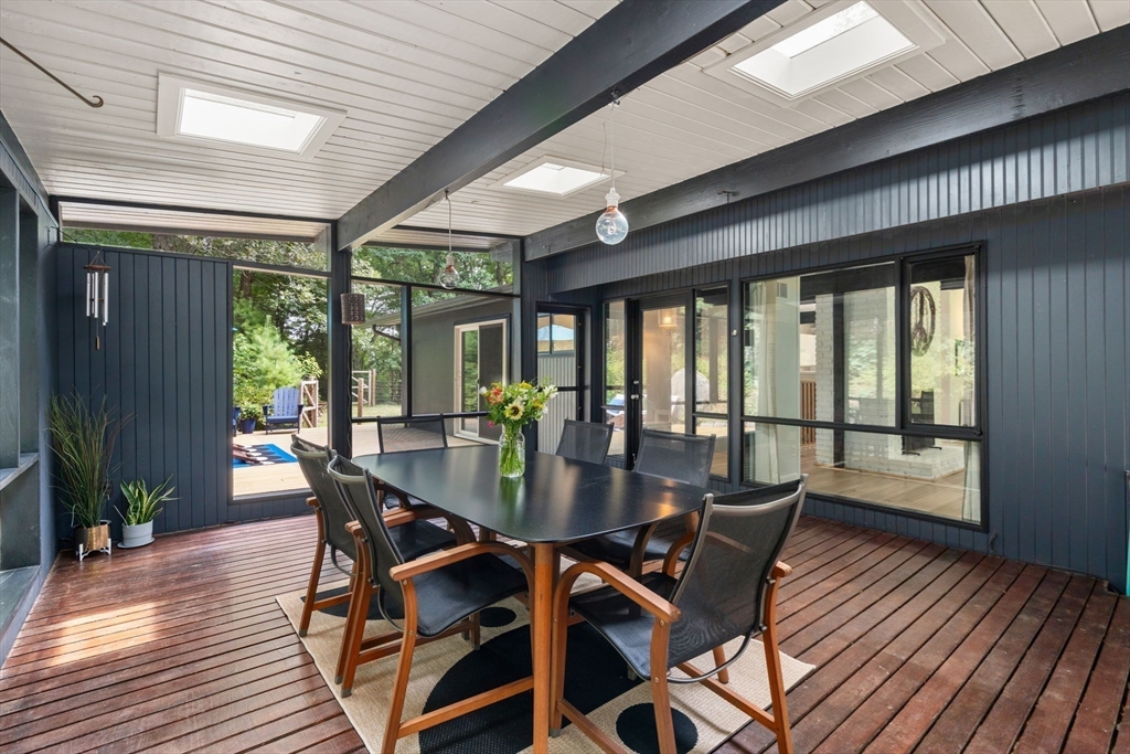 5 Apple Street Sherborn, MA 01770 - Photo 14 of 36 a view of a dining room with furniture window and wooden floor