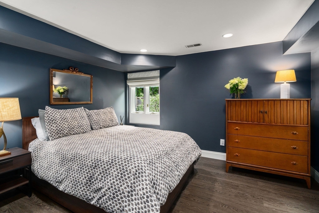 5 Apple Street Sherborn, MA 01770 - Photo 26 of 36 a bedroom with a bed and a night stand