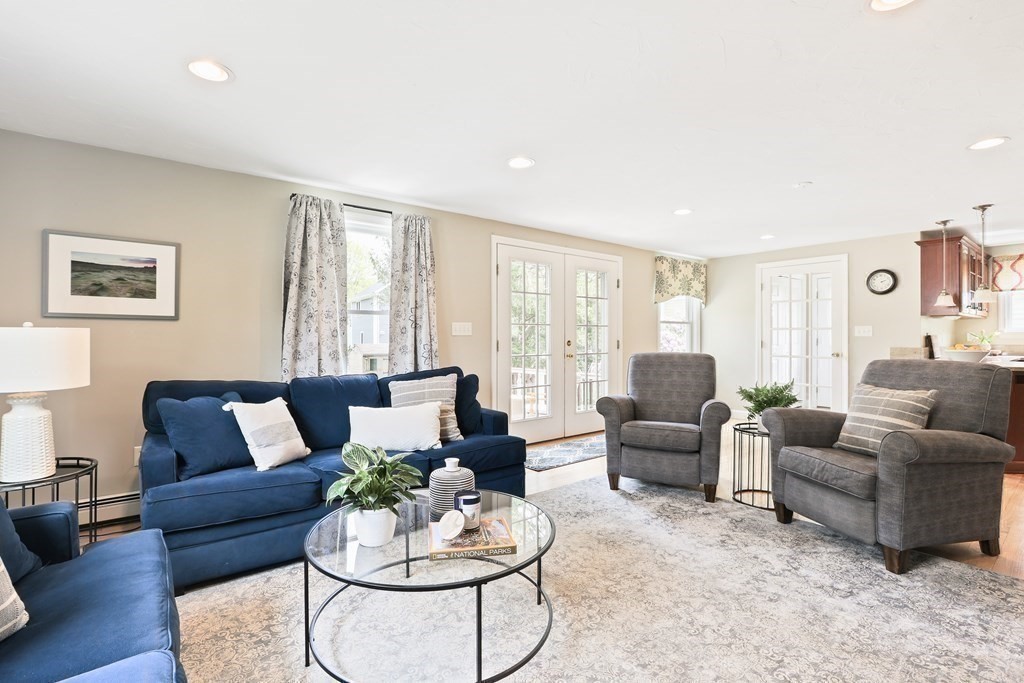 18 Moore Street Natick, MA 01760 - Photo 1 of 42 a living room with furniture and a large window