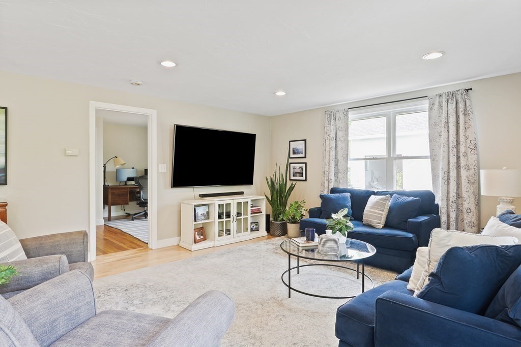 18 Moore Street Natick, MA 01760 - Photo 13 of 42 a living room with furniture and a flat screen tv