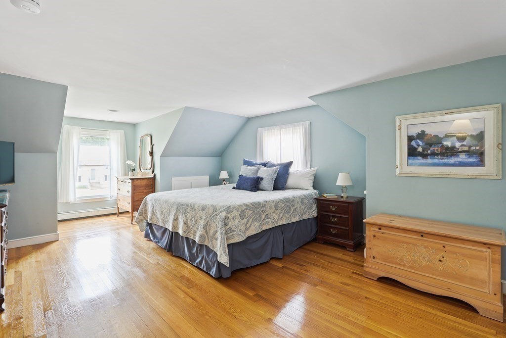 18 Moore Street Natick, MA 01760 - Photo 22 of 42 a bedroom with a bed lamp closet and window