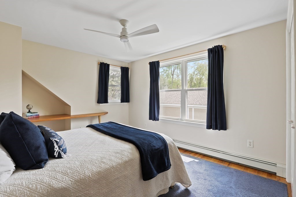 18 Moore Street Natick, MA 01760 - Photo 24 of 42 a bedroom with a bed and a window