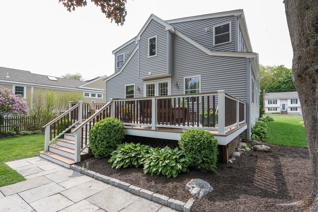 18 Moore Street Natick, MA 01760 - Photo 35 of 42 a view of a house with backyard and garden