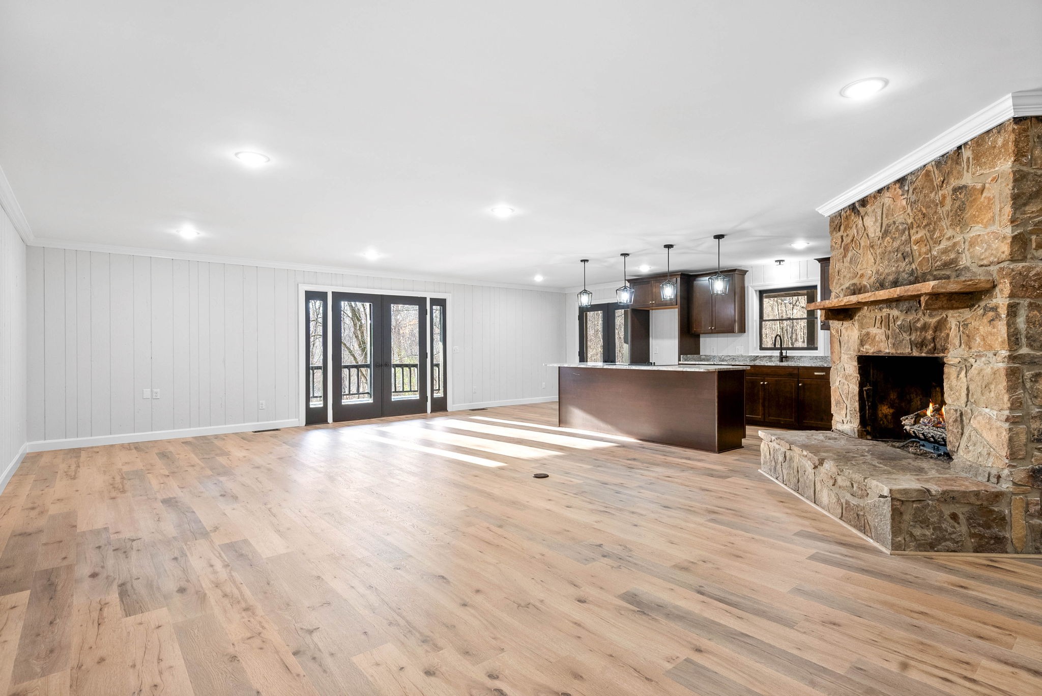 140 Dean Road Clarksville, TN 37040 - Photo 12 of 44 a view of a kitchen with furniture and a fireplace