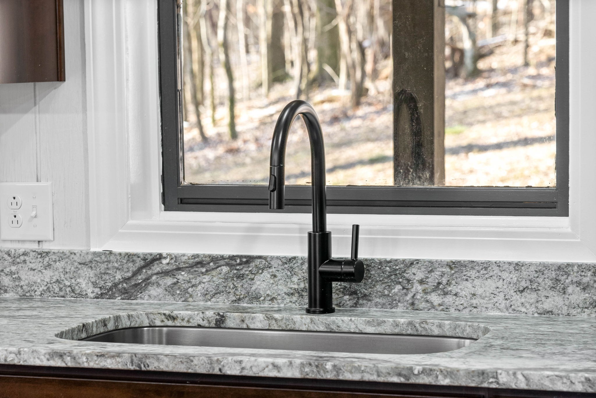 140 Dean Road Clarksville, TN 37040 - Photo 16 of 44 a kitchen with granite countertop a sink and a window