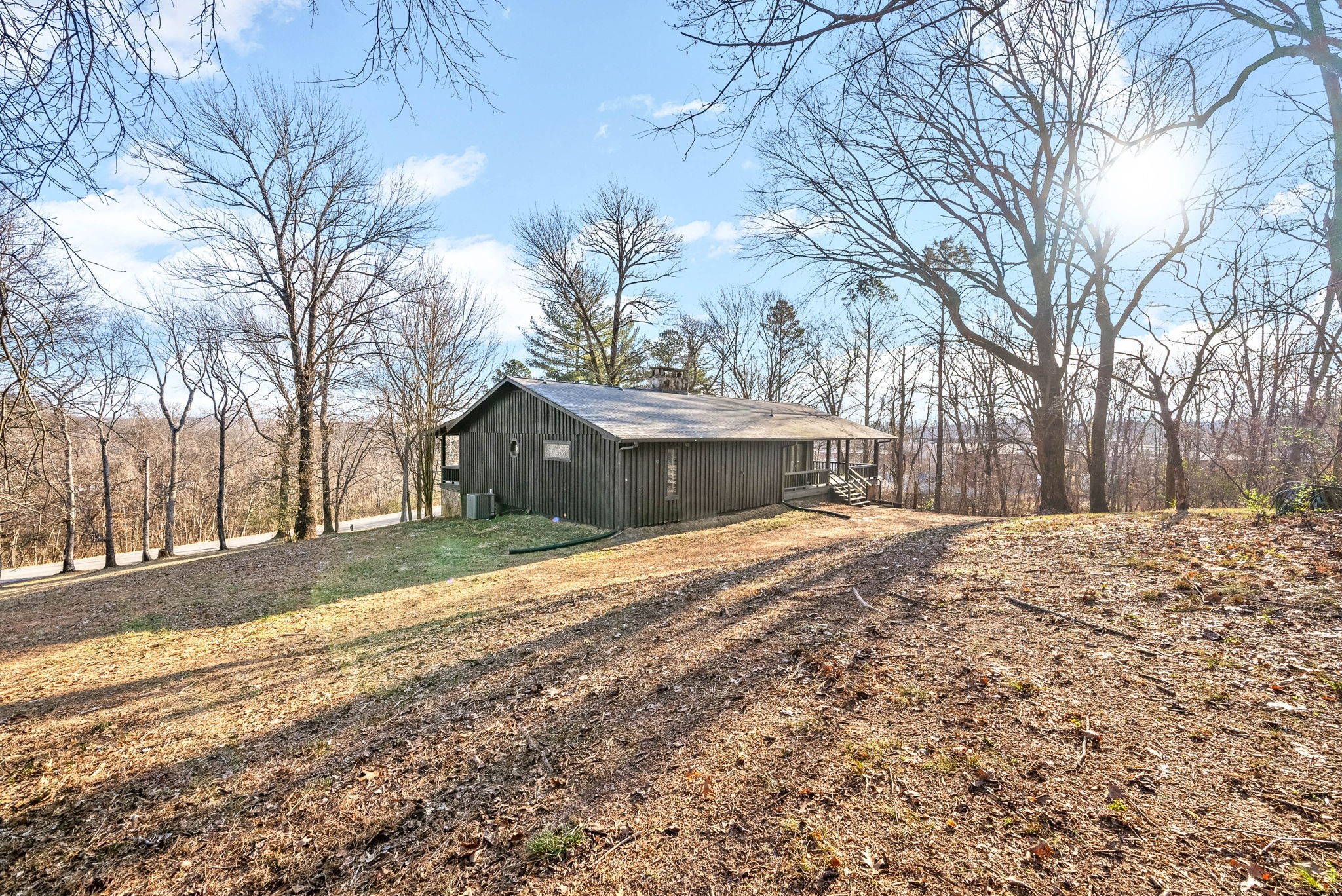 140 Dean Road Clarksville, TN 37040 - Photo 6 of 44 a front view of a house with a yard covered with snow