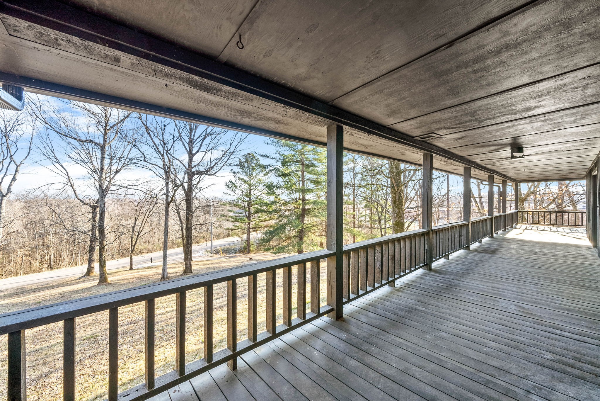 140 Dean Road Clarksville, TN 37040 - Photo 9 of 44 a view of a porch with wooden floor and outdoor space