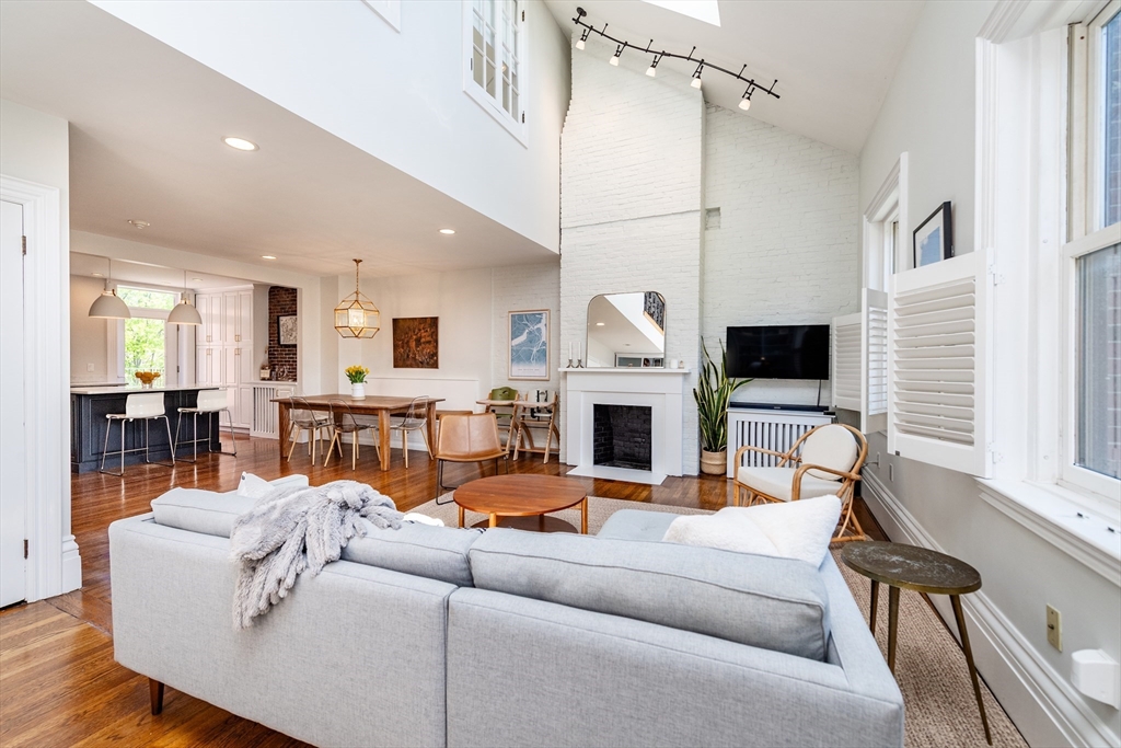 13 Harvard Street, Unit 3 Boston, MA 02129 - Photo 5 of 14 a living room with furniture fireplace and flat screen tv