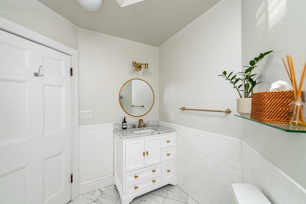 13 Harvard Street, Unit 3 Boston, MA 02129 - Photo 7 of 14 a living room with furniture
