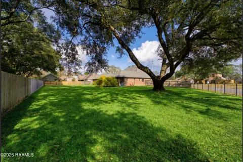 $550,000 | 117 Hundred Oaks Drive, Youngsville, LA 70592
