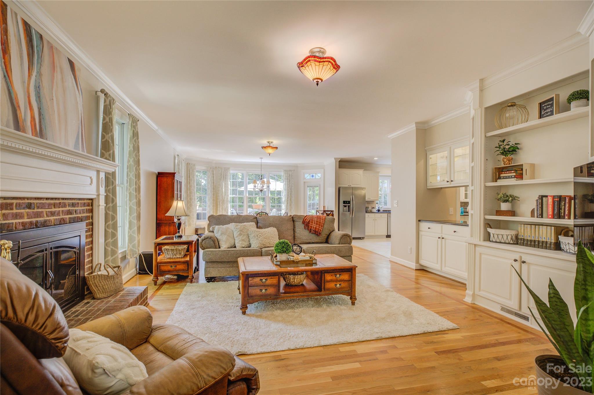12017 Forest Home Drive Fort Mill, SC 29708 - Photo 11 of 44 a living room with furniture or couch and a fireplace