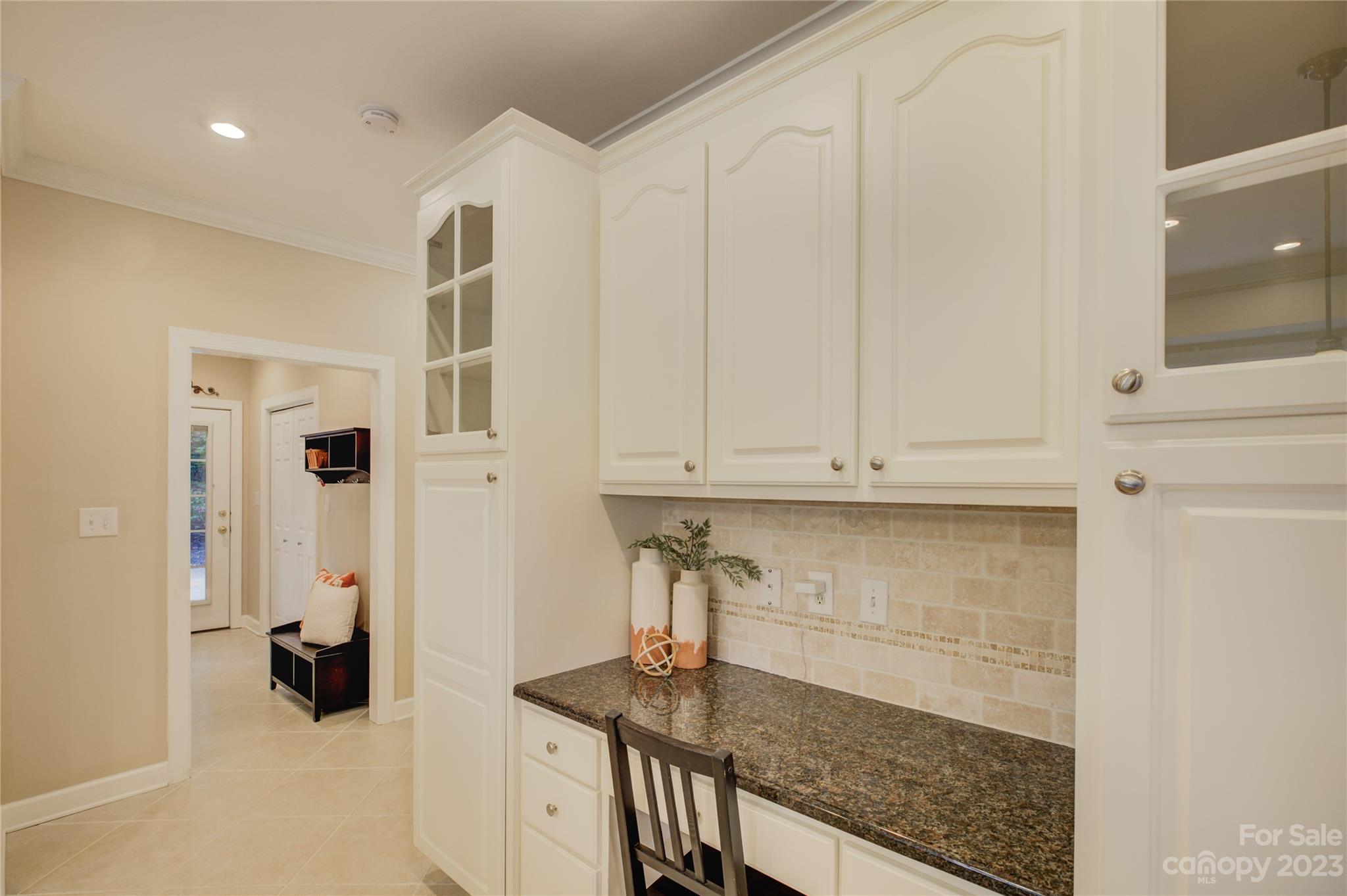 12017 Forest Home Drive Fort Mill, SC 29708 - Photo 19 of 44 a kitchen with stainless steel appliances a refrigerator and cabinets