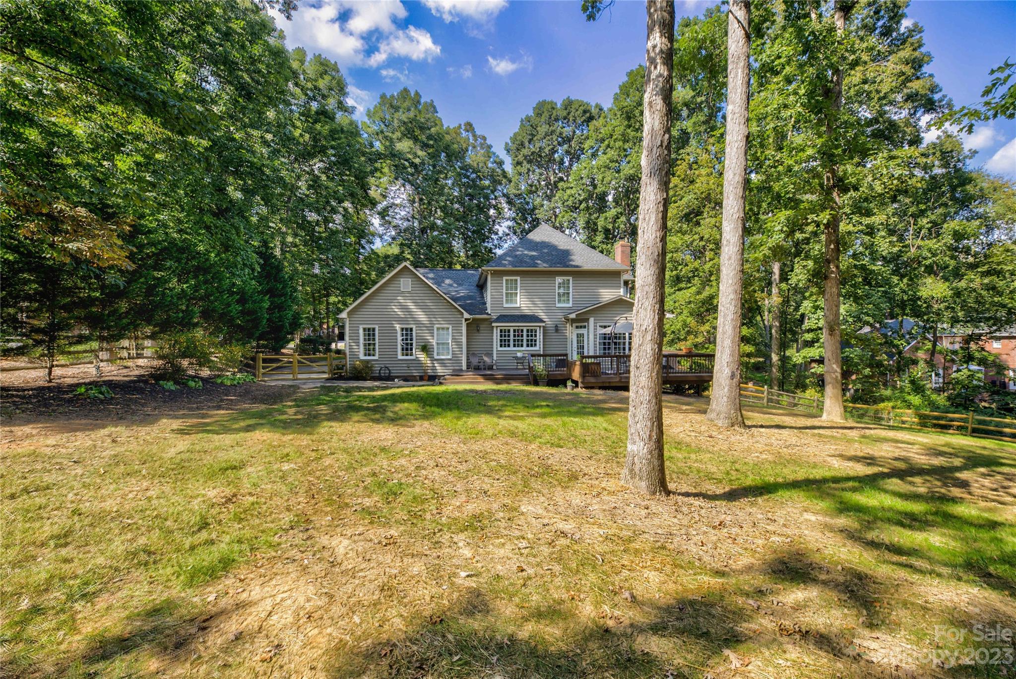 12017 Forest Home Drive Fort Mill, SC 29708 - Photo 37 of 44 a house with swimming pool in front of it