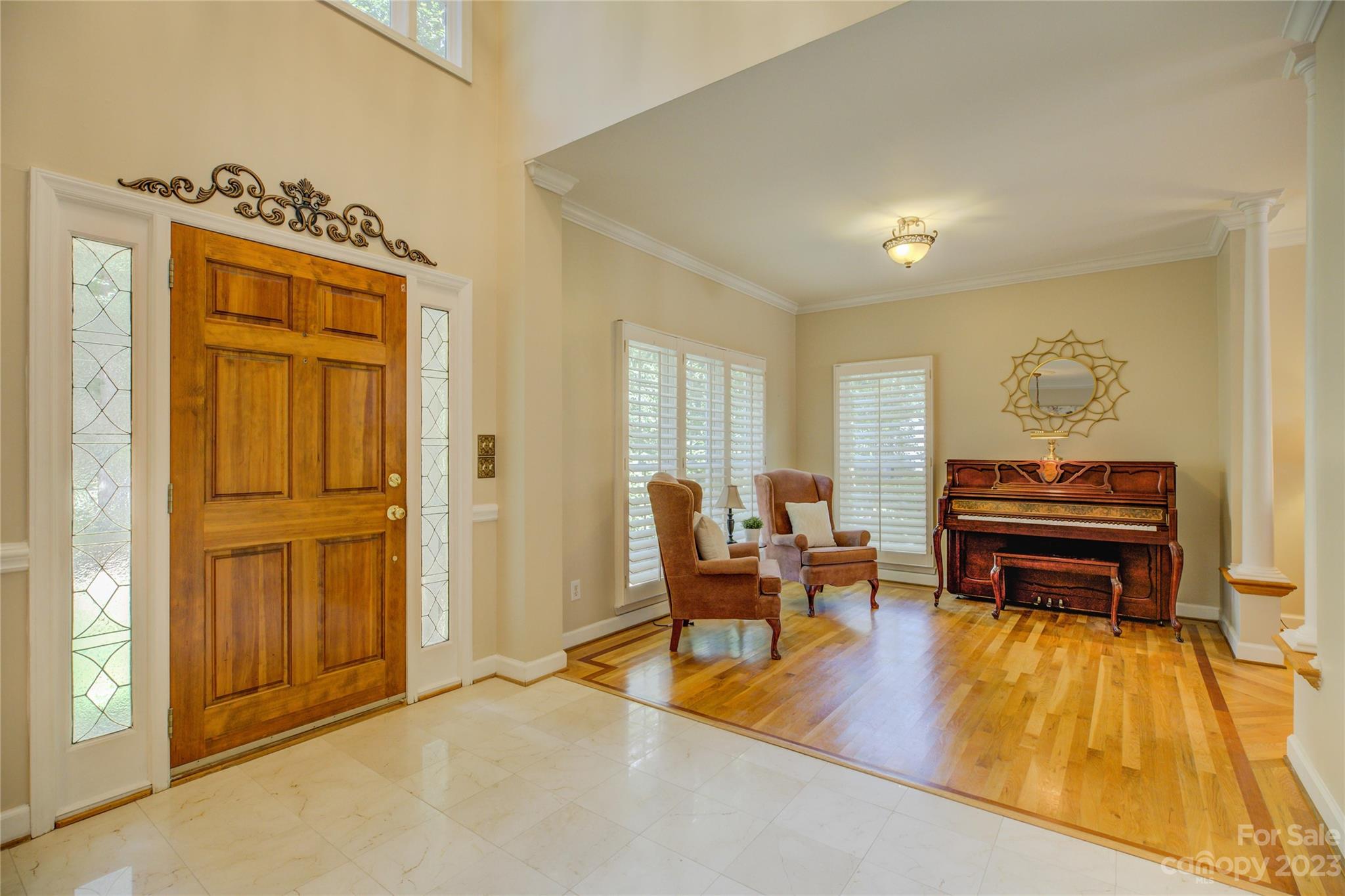 12017 Forest Home Drive Fort Mill, SC 29708 - Photo 9 of 44 a living room with furniture and a piano table