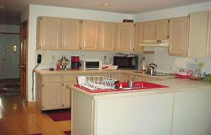 2 West Rinker Road Stroudsburg, PA 18360 - Photo 6 of 7 a kitchen with stainless steel appliances granite countertop a sink and cabinets