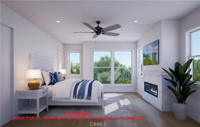 a bedroom with furniture and a fireplace