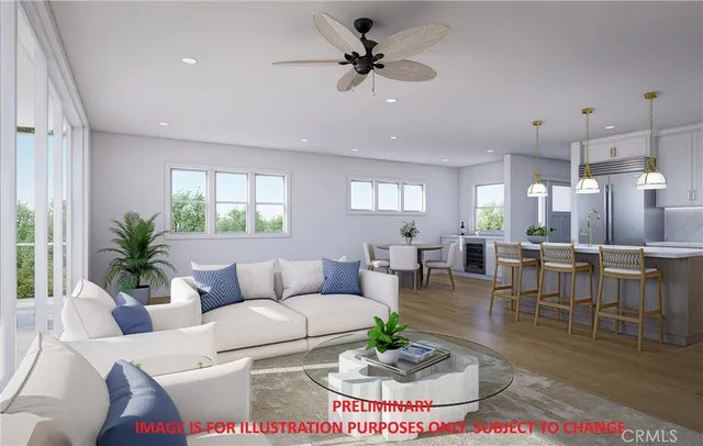 a living room with furniture a dining table and a potted plant