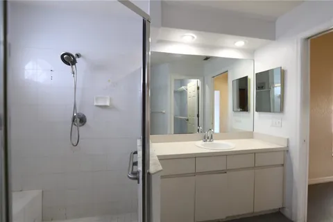 a bathroom with a sink and mirror