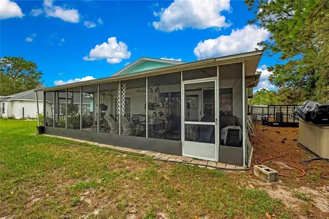 a view of a porch with a backyard