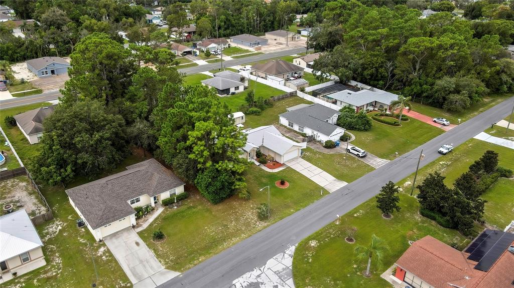 11322 Topaz Street Spring Hill, FL 34608 - Photo 38 of 41 an aerial view of a house with a garden