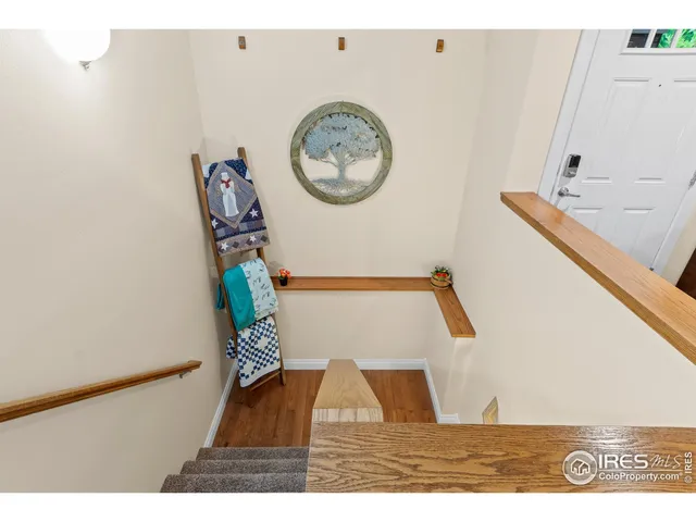 a bathroom with a tub a sink and a mirror
