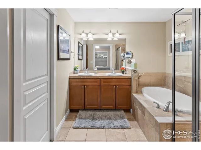 a bedroom with a bed and a table in it