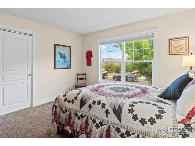 a balcony with table and chairs