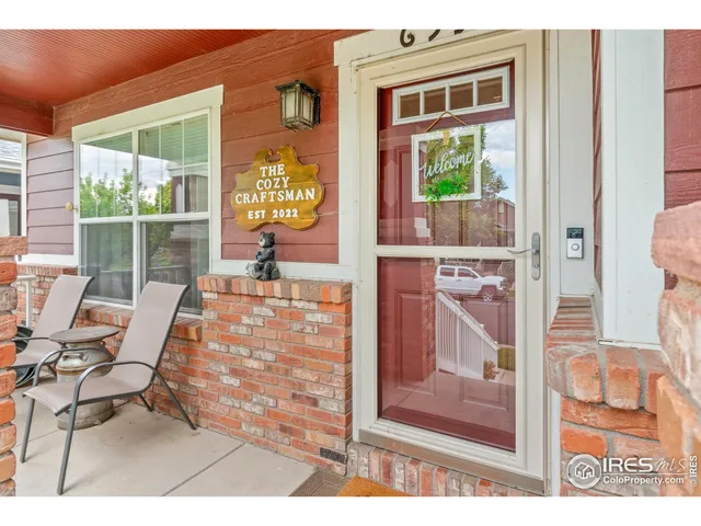 a dining table & chairs in a room