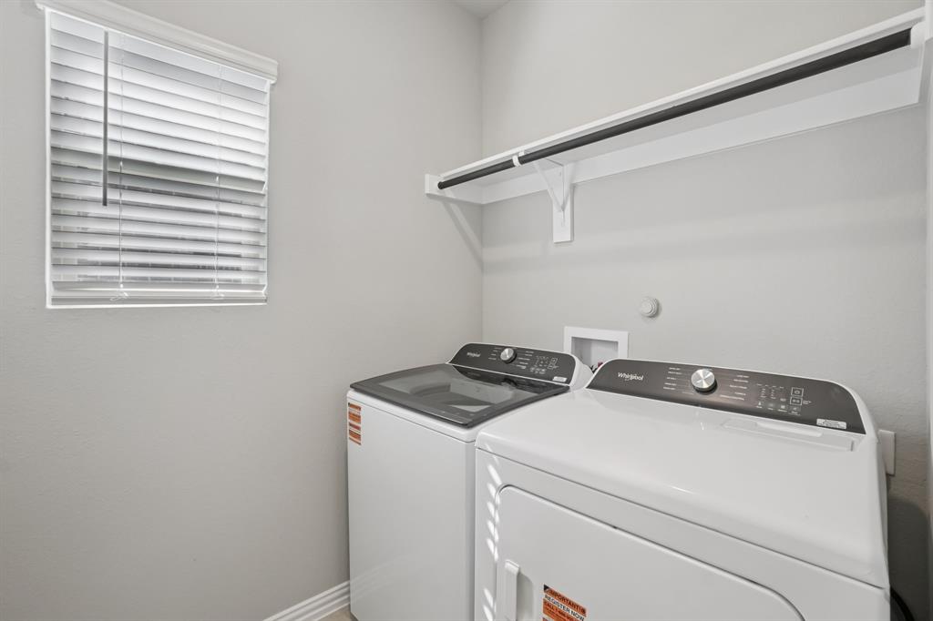 1725 Arches Road Anna, TX 75409 - Photo 17 of 28 a utility room with dryer and washer