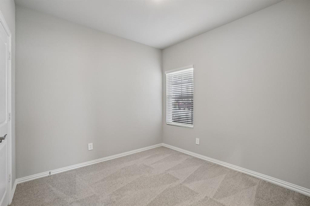 1725 Arches Road Anna, TX 75409 - Photo 20 of 28 an empty room with a window