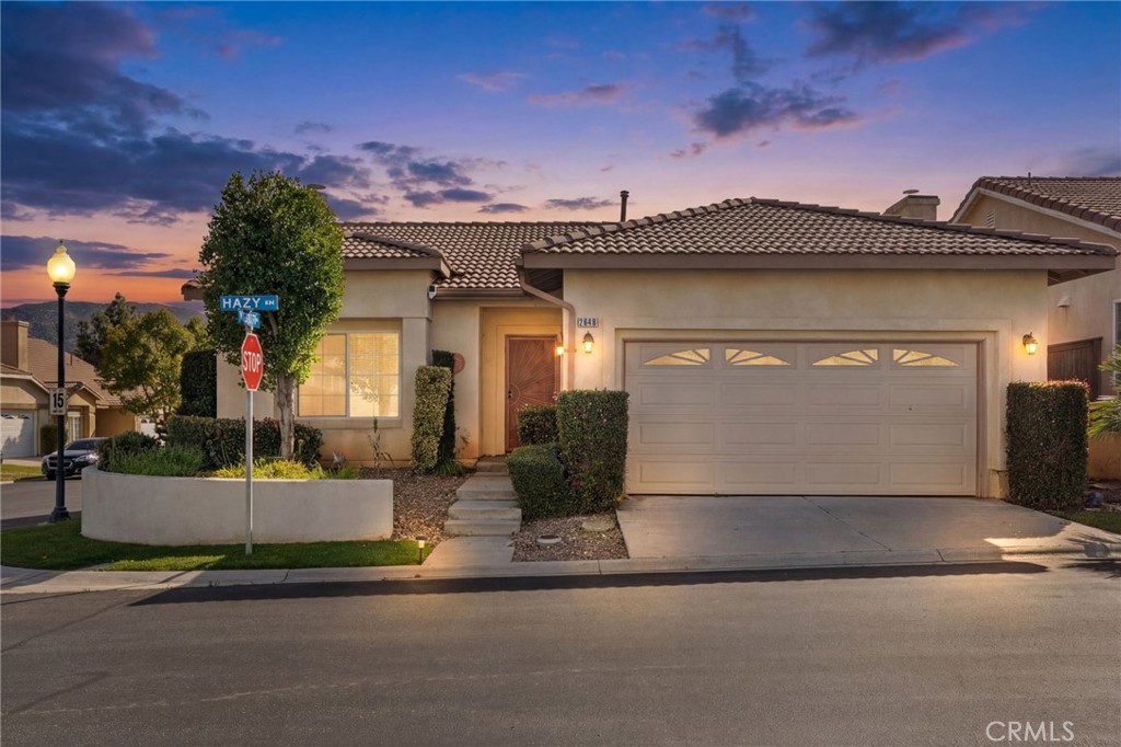 2648 Hazy Way Banning, CA 92220 - Photo 1 of 1 a front view of a house with garden